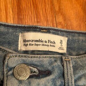 Light Wash High Waisted Ripped Jeans